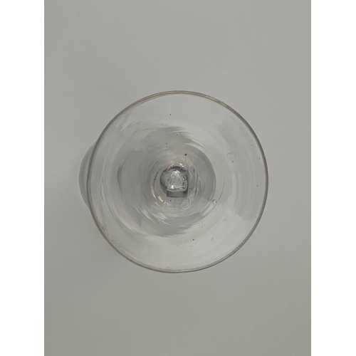 566 - An opaque twist wine glass, circa 1760, the ogee bowl on a double spiral and central multi strand tw... 