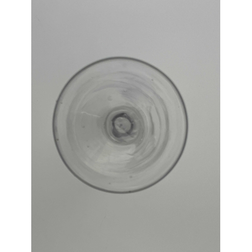 567 - An opaque twist wine glass, circa 1760, the round funnel bowl on a double series, multi stranded rib... 