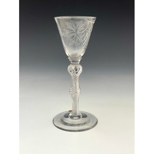 578 - A Jacobite type double knopped air twist wine glass, circa 1755, the round funnel bowl engraved and ... 