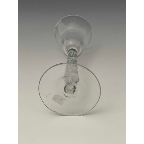 579 - A plain stemmed wine glass, circa 1740, the ogee bowl on cylindrical stem and conical folded foot, 1... 