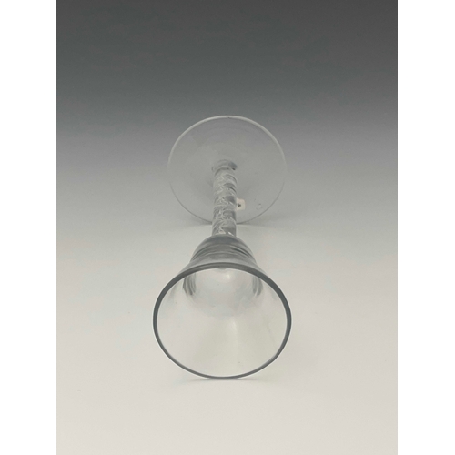 587 - An airtwist wine glass, circa 1755, the pan topped bowl on a multi strand open spiral stem, conical ... 