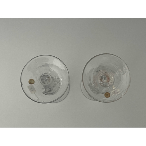 592 - A near pair of airtwist wine glasses, circa 1755, the bell shaped bowls on inverse baluster multi sp... 