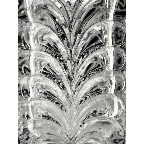 607 - Baccarat, a 19th century glass spirit decanter, circa 1835, in a moulded honeysuckle design, cuboid ... 