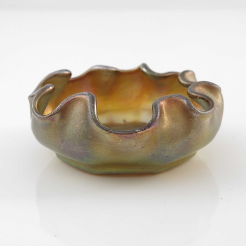 612 - Louis Comfort Tiffany, an Arts and Crafts iridescent glass dish, circa 1910, rounded with inverted a... 