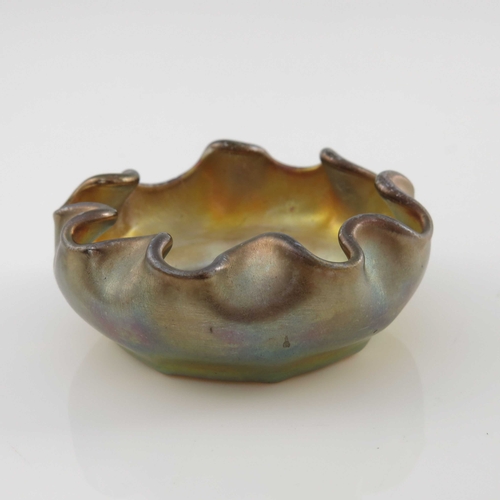 612 - Louis Comfort Tiffany, an Arts and Crafts iridescent glass dish, circa 1910, rounded with inverted a... 