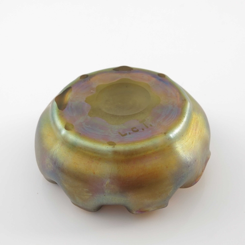 612 - Louis Comfort Tiffany, an Arts and Crafts iridescent glass dish, circa 1910, rounded with inverted a... 