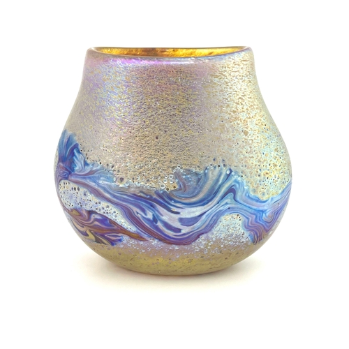 635 - Siddy Langley, an iridescent studio glass vase, 1997, flattened baluster form, applied with a natura... 