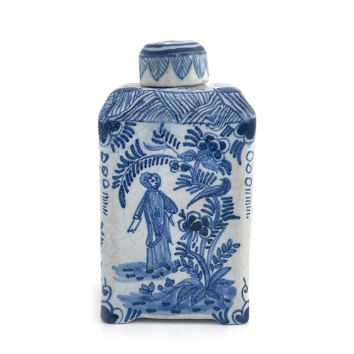 640 - A Dutch Delft blue and white tea caddy, 18th century, cuboid form, painted with Chinese style figure... 