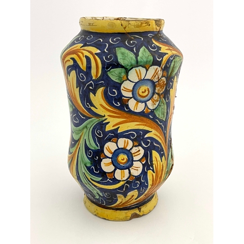 641 - An Italian Maiolica albarello pharmacy jar, probably 17th century, waisted shouldered form, polychro... 