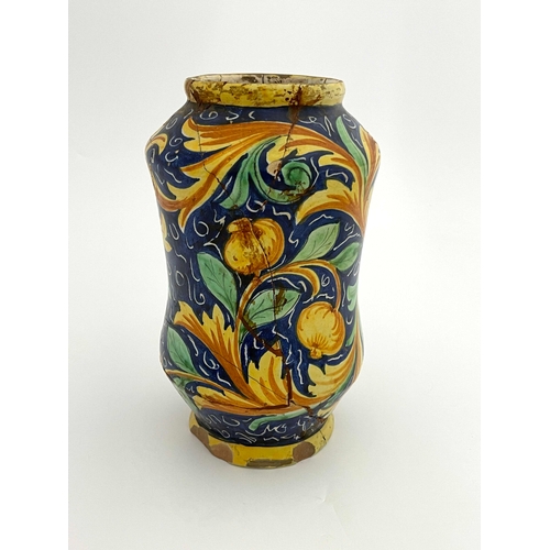 641 - An Italian Maiolica albarello pharmacy jar, probably 17th century, waisted shouldered form, polychro... 