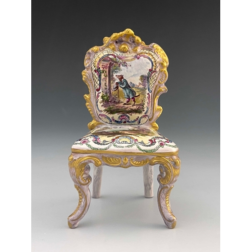 645 - Veuve Perrin (attributed), a French faience toy model of a chair, in the Louis XV style, relief mode... 