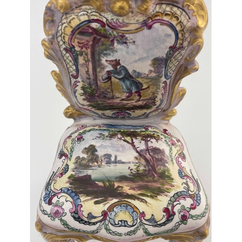 645 - Veuve Perrin (attributed), a French faience toy model of a chair, in the Louis XV style, relief mode... 