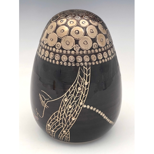 665 - Sally Tuffin for Dennis China Works, a Fulani silver lustre head shape pot, ovoid form,2007, marked ... 