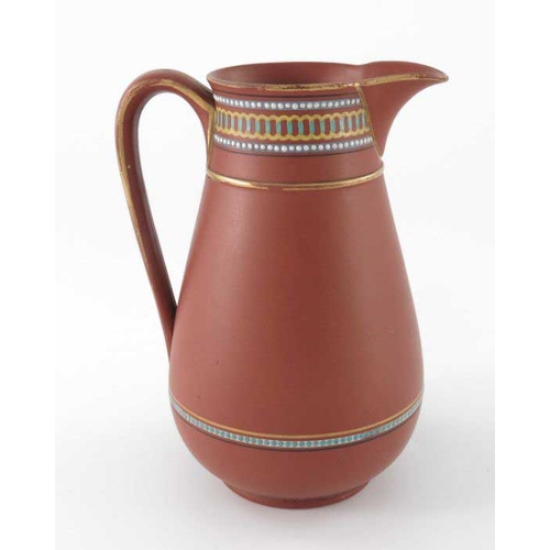 691 - Christopher Dresser (attributed) for Watcombe, an art pottery terracotta jug, circa 1885, rounded co... 