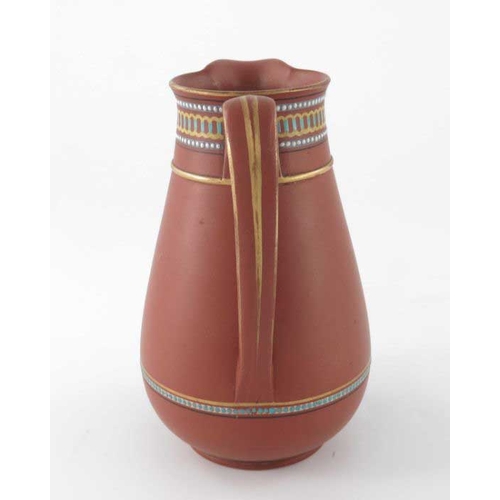 691 - Christopher Dresser (attributed) for Watcombe, an art pottery terracotta jug, circa 1885, rounded co... 