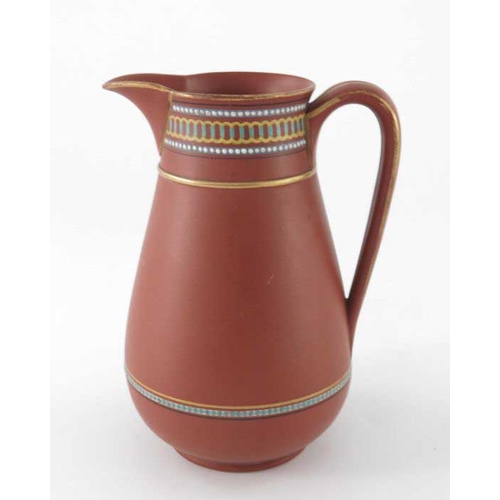 691 - Christopher Dresser (attributed) for Watcombe, an art pottery terracotta jug, circa 1885, rounded co... 