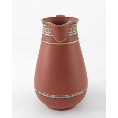 691 - Christopher Dresser (attributed) for Watcombe, an art pottery terracotta jug, circa 1885, rounded co... 