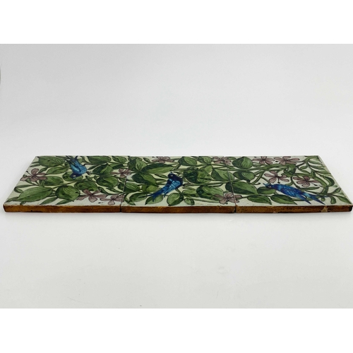 695 - William De Morgan for Merton Abbey, an Arts and Crafts three tile panel, circa 1890, each with a blu... 