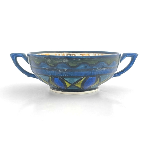 699 - John Pearson, an Arts and Crafts lustre twin handled motto bowl, the interior painted with rosettes ... 