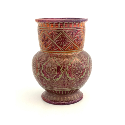 701 - Maw and Co., a Persian Lustre vase, 1890, footed bulbous form, painted with Moorish floral motifs an... 