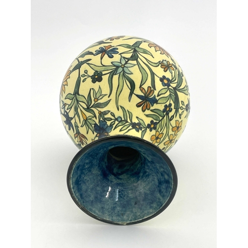 708 - Mary Butterton for Doulton Lambeth, a Faience vase, 1877, ovoid bottle form with flared neck, painte... 