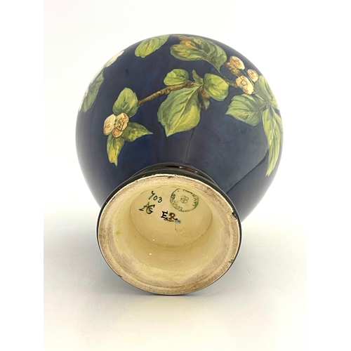 710 - Alberta Green for Doulton Lambeth, a Faience vase, shouldered and footed ovoid form, painted with fr... 