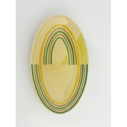 739 - Susie Cooper, an Art Deco plate, 1930s, oval form, painted concentric bands in green, purple and yel... 