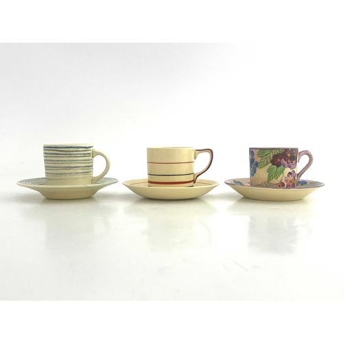 740 - Susie Cooper, three Art Deco and Gray's Pottery coffee cans and saucers, including concentric ring e... 