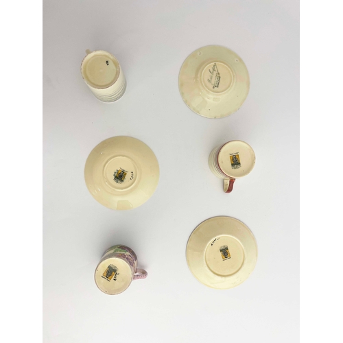 740 - Susie Cooper, three Art Deco and Gray's Pottery coffee cans and saucers, including concentric ring e... 