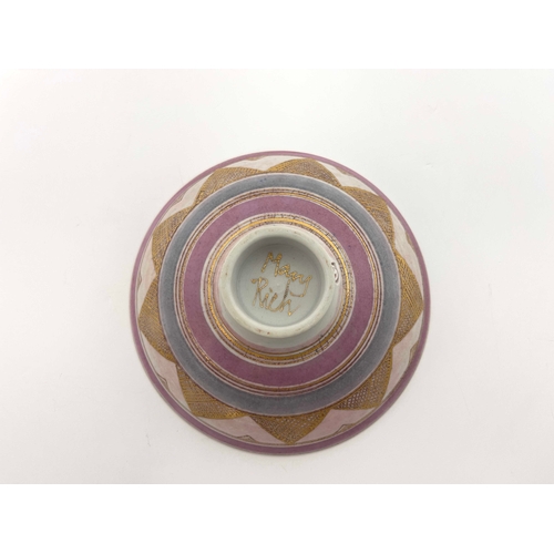 746 - Mary Rich, two studio pottery bowls, shallow conical form, painted with concentric chevron bands in ... 