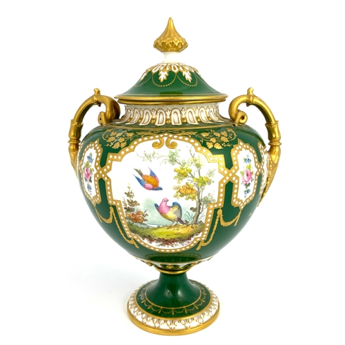 765 - C Harris for Royal Crown Derby, a twin handled pedestal vase and cover, urn form painted with exotic... 