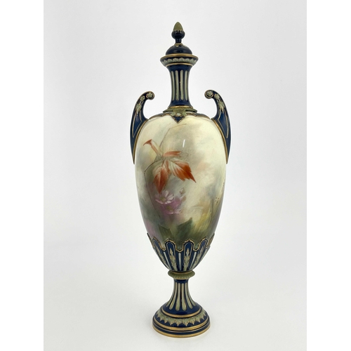 773 - A Hadleys Worcester twin handled vase and cover, relief moulded pedestal urn form, painted with a ph... 