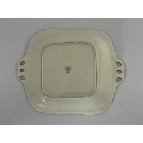 783 - Horace Price for Royal Worcester, a fruit painted plate, circa 1926, square twin handled form, decor... 