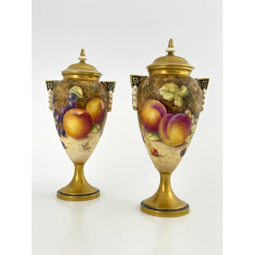 787 - S Weston for Royal Worcester, a pair of fruit painted pedestal vases and covers, ovoid footed form, ... 