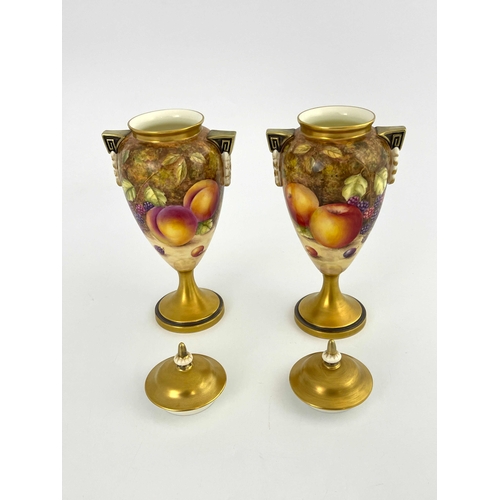 787 - S Weston for Royal Worcester, a pair of fruit painted pedestal vases and covers, ovoid footed form, ... 