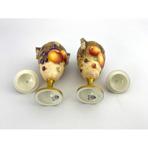 787 - S Weston for Royal Worcester, a pair of fruit painted pedestal vases and covers, ovoid footed form, ... 