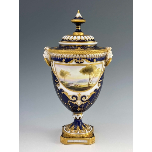 789 - Harry Davies for Royal Worcester, a landscape painted urn vase, twin handled pedestal form, the demi... 