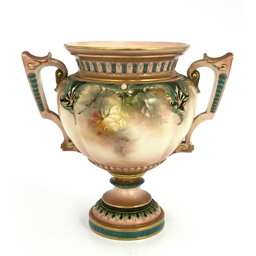 804 - A Hadleys Worcester pedestal vase, twin handled, painted with roses below relief moulded foliate bor... 