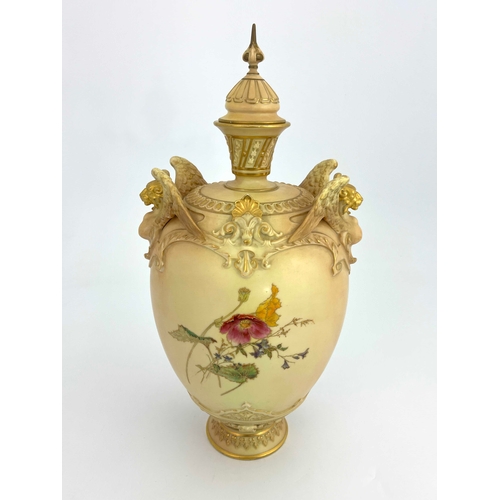 806 - A Royal Worcester blush ivory vase and cover,  ovoid form with relief moulded winged lion handles, p... 