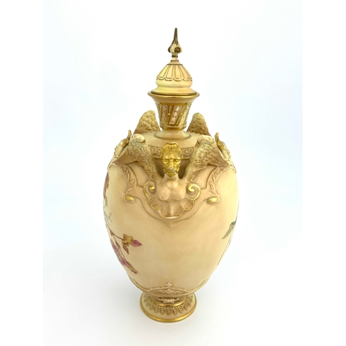 806 - A Royal Worcester blush ivory vase and cover,  ovoid form with relief moulded winged lion handles, p... 