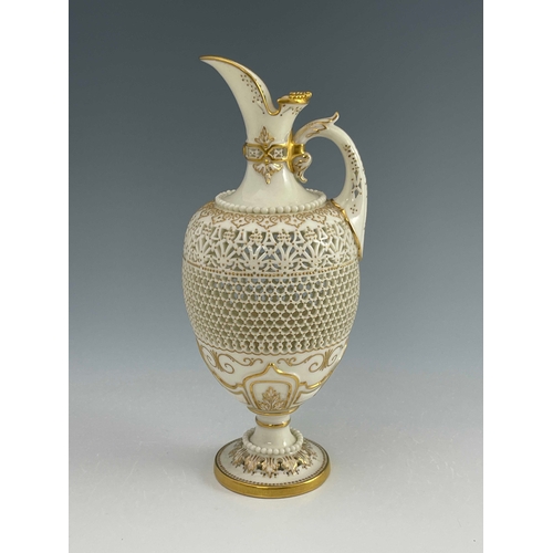 808 - George Owen for Royal Worcester, a reticulated ewer, 1919, pedestal ovoid form, pierced with hexagon... 