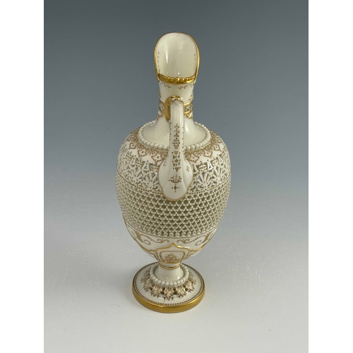 808 - George Owen for Royal Worcester, a reticulated ewer, 1919, pedestal ovoid form, pierced with hexagon... 