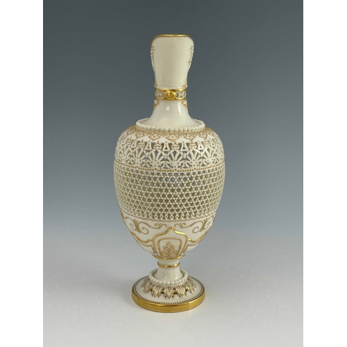 808 - George Owen for Royal Worcester, a reticulated ewer, 1919, pedestal ovoid form, pierced with hexagon... 