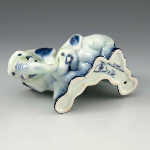 814 - A Doulton group of a mother elephant and young in a prototype flambé glaze