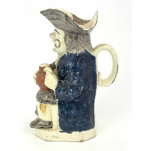 833 - A Staffordshire Prattware Toby jug, Ralph Wood mould, circa 1800, modelled sitting with a frothing j... 