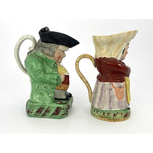 835 - Two Staffordshire Toby jugs, including Martha Gunn, modelled with hands clasped around a gin glass, ... 