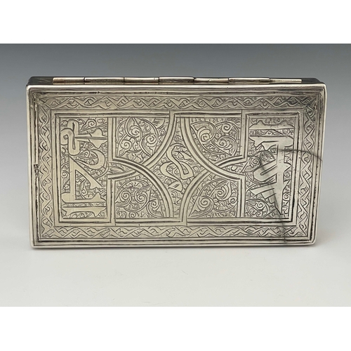 2 - An Egyptian silver box, cuboid form with hinged lid, engraved ad chased with Persian style foliate a... 