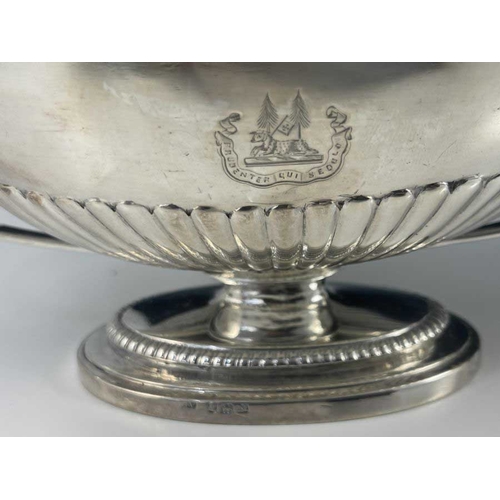 21 - A matched pair of George III silver sauce tureens and covers, Abraham Peterson and John Emes, London... 