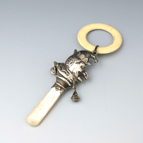 26 - An Elizabeth II novelty silver baby's teething rattle, W.H. Collins & Co, Chester 1959, formed as Mr... 