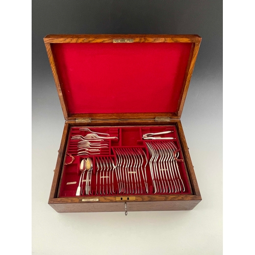 29 - An extensive part canteen of silver flatware, various dates and makers, Fiddle Pattern, in wooden bo... 